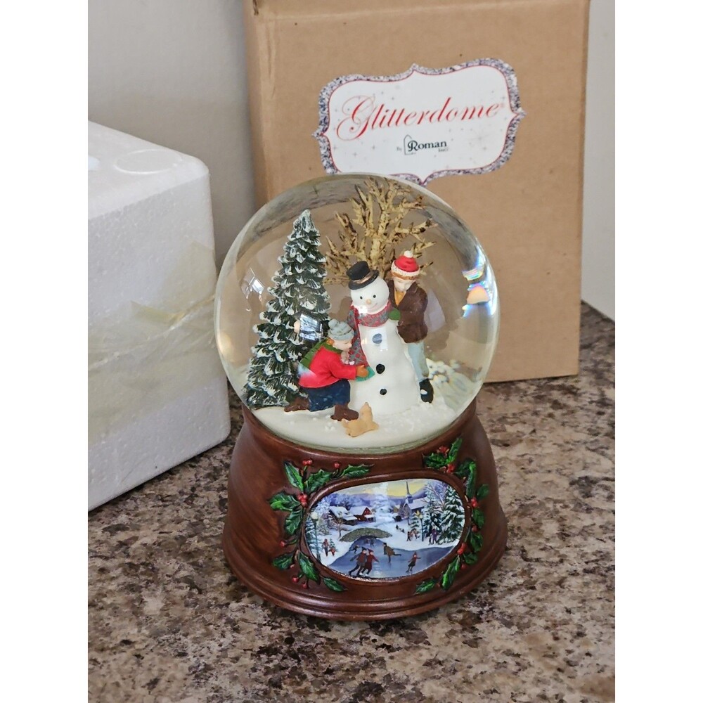 Musical Roman Snow Globe Snowman Scene Plays We Wish You a Merry Christmas